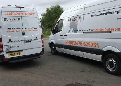 Two vans from the Nu Vision Logistics fleet