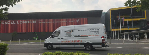 A Nu Vision Logistics delivery van on the road